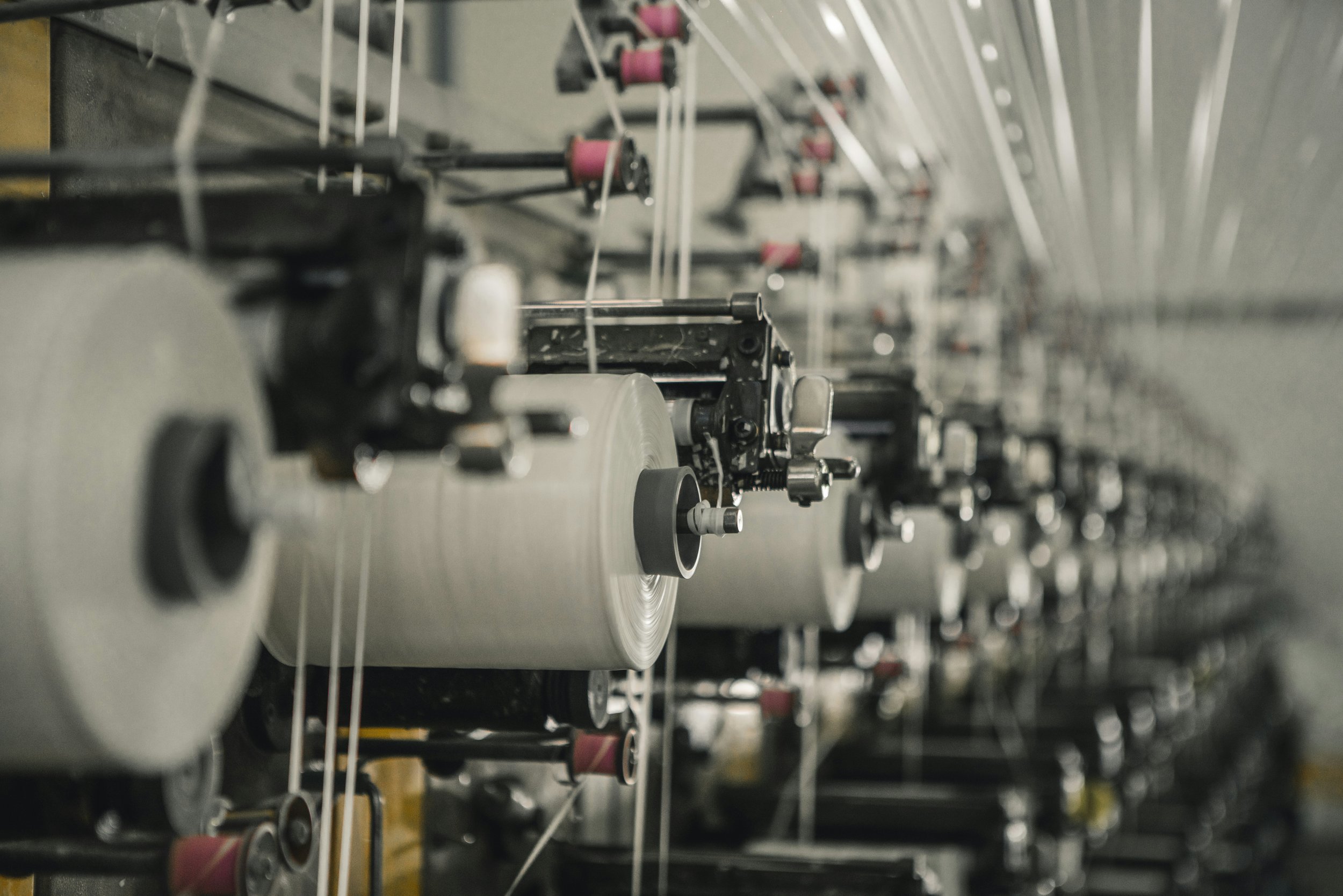 Quality textile inspection and sustainable woven fabric preparation at KBK Exports