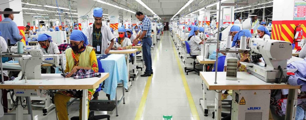 Advanced industrial sewing machinery and garment manufacturing facility at KBK Exports